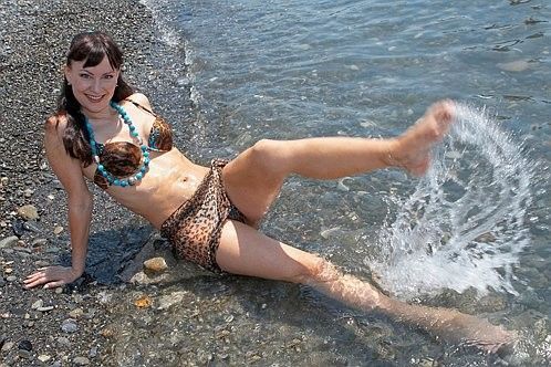 012 эротическое фото,  Нонна Гришаева с голой грудью во время эротической фотосессии